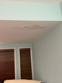 Photos of ceiling in the den near master bedroom