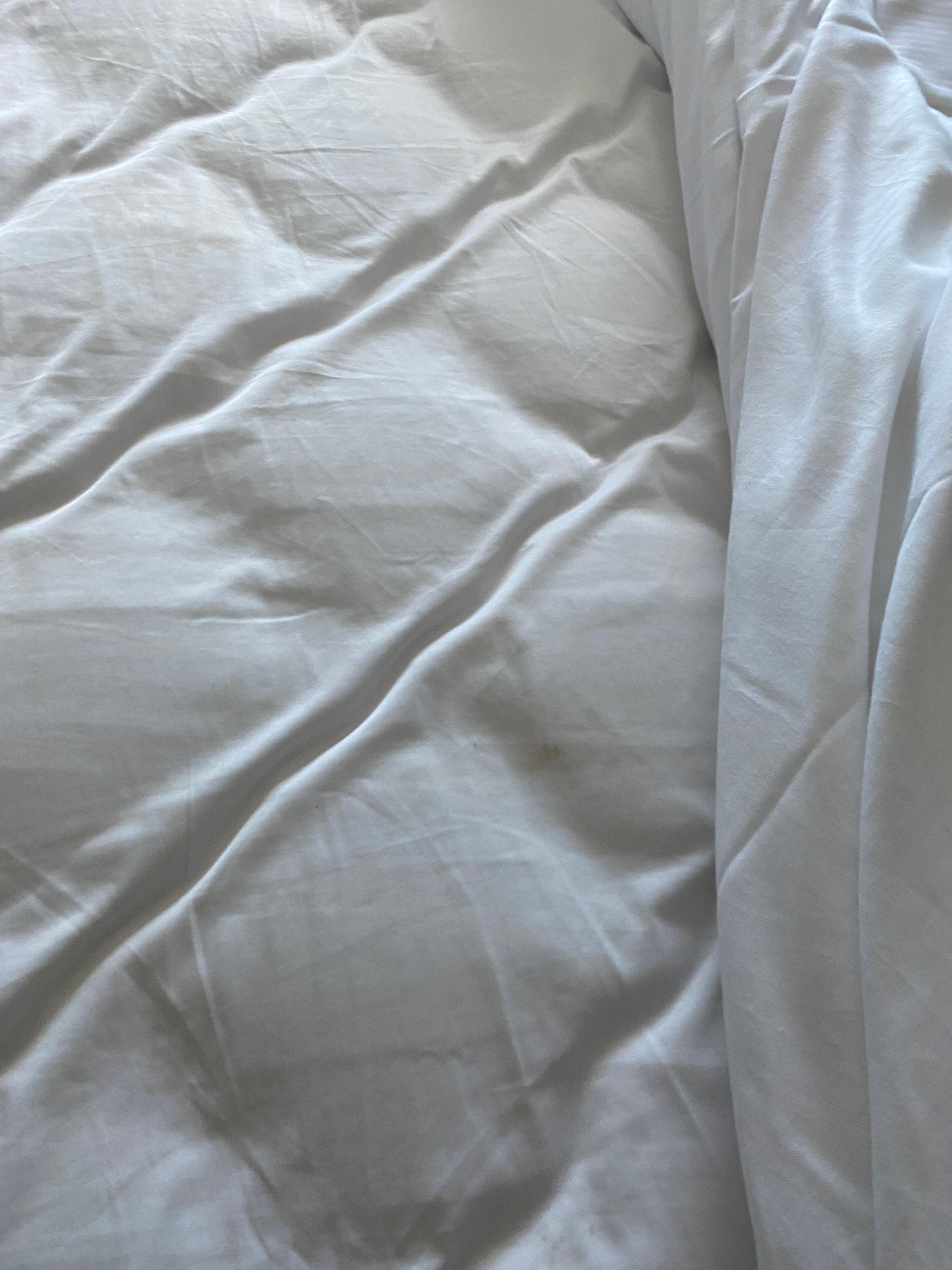 First room: sheets with stains and hair.