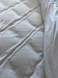 First room: sheets with stains and hair.