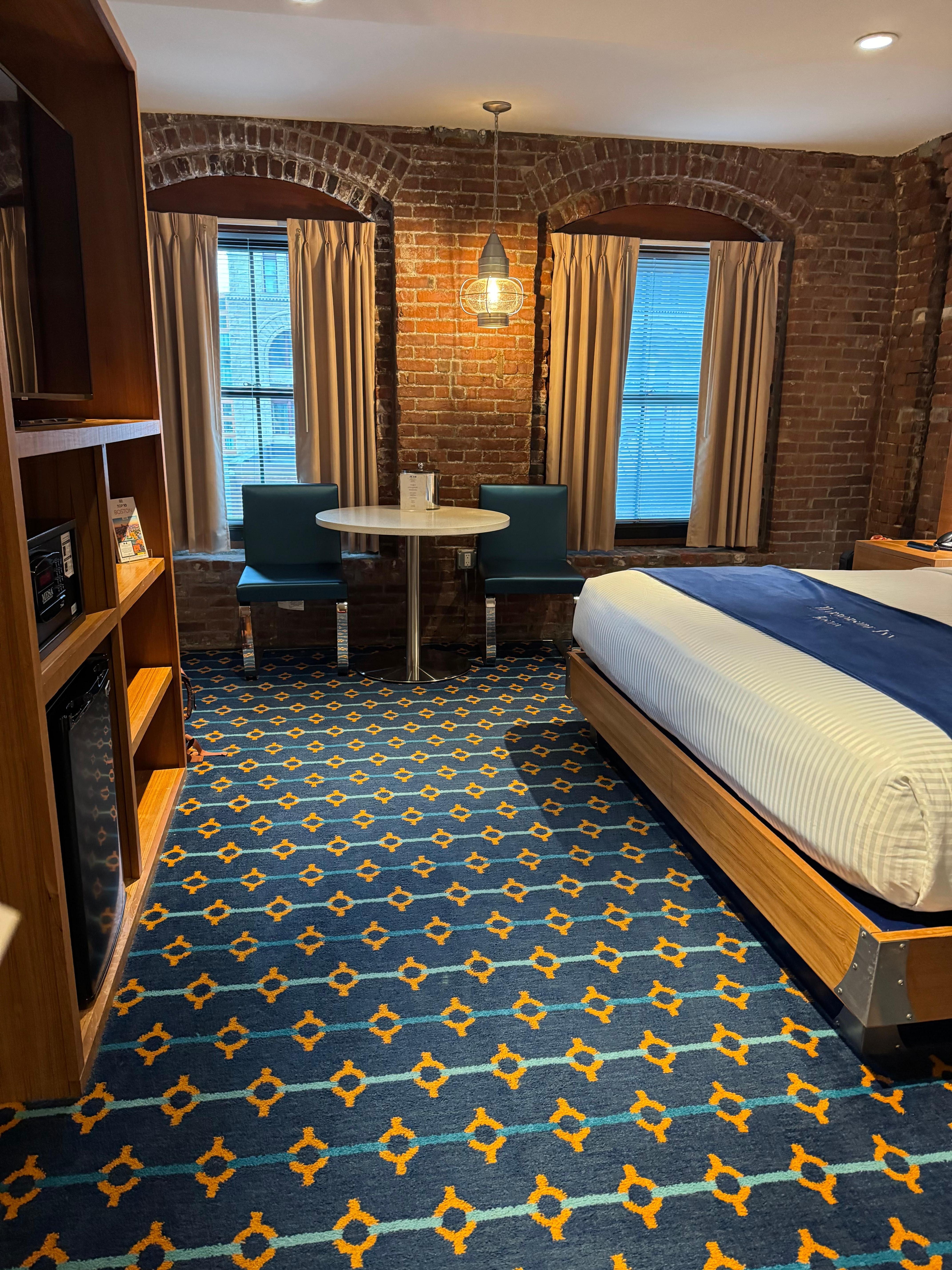 Room was spacious especially for a city. We appreciated the mini fridge, storage areas, bedside tables and lamps, table and chairs and more. 