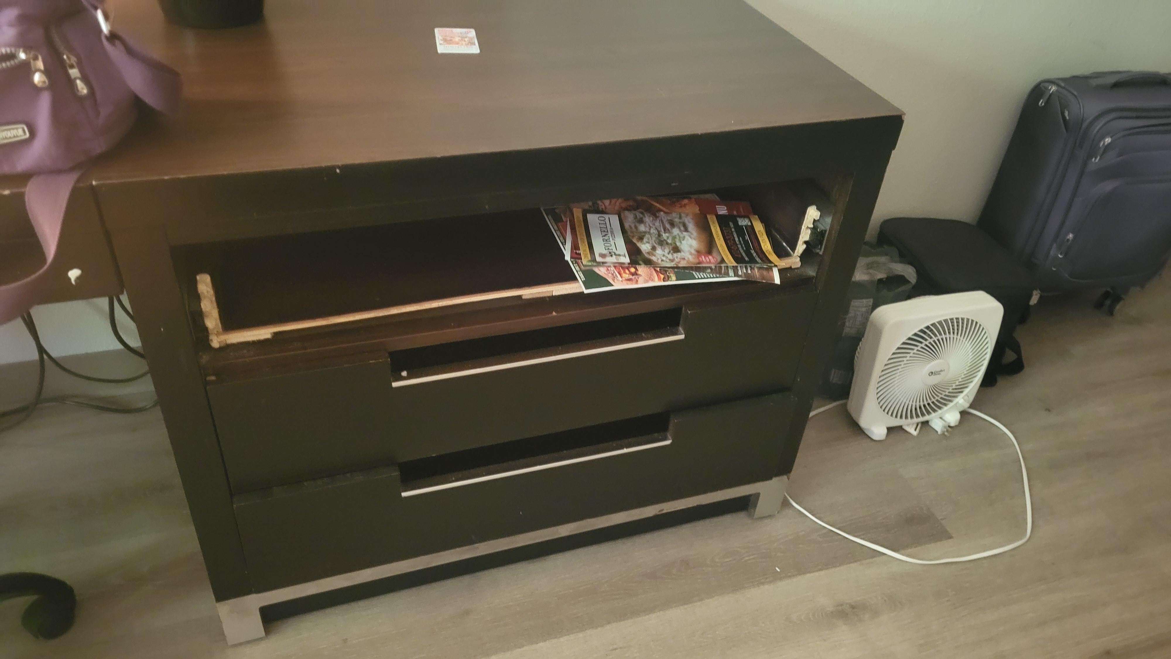 Busted missing drawers.