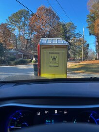 Portable potty at the end of the driveway