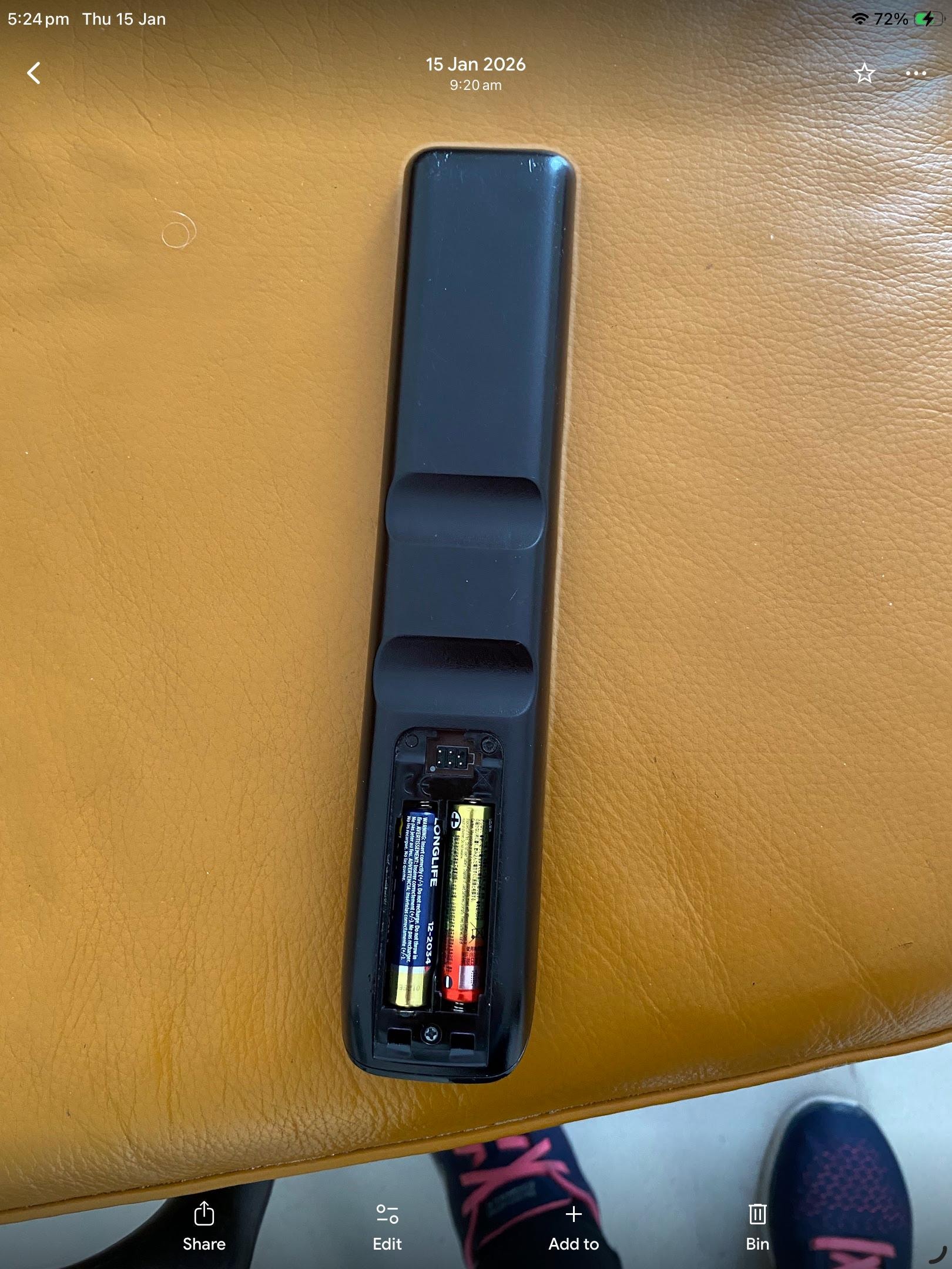 TV remote with no battery cover 
.