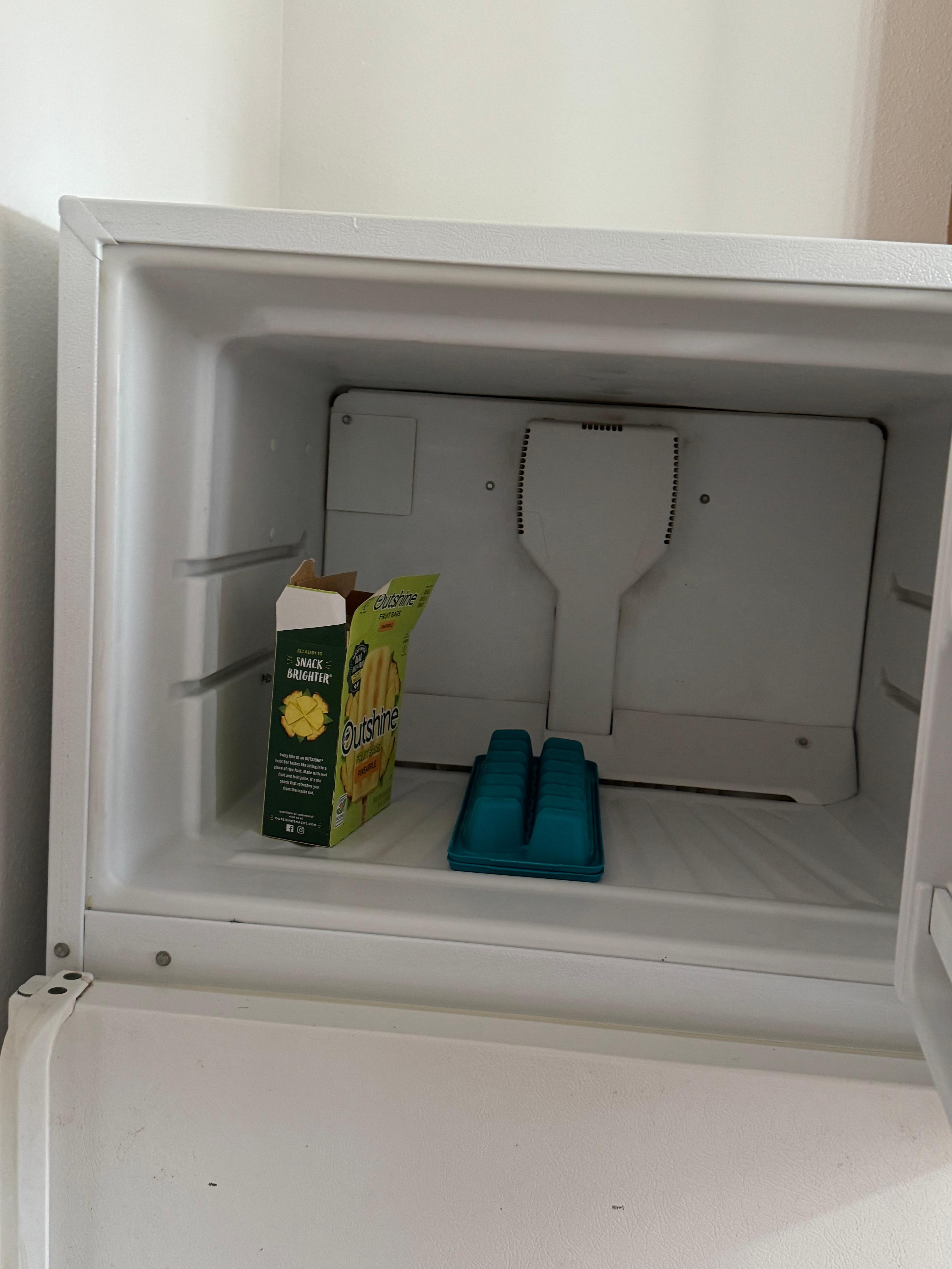 Open leftovers in the fridge, after the manager verified with his staff member that she indeed checked the room that it was clean.
