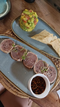 Tuna tataki and mango-avocado-tomato tartar.