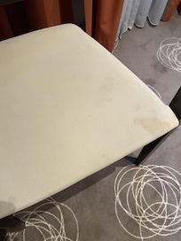 History of various stains on seat cushion