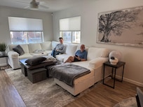 Lots of natural light and a comfortable living room area