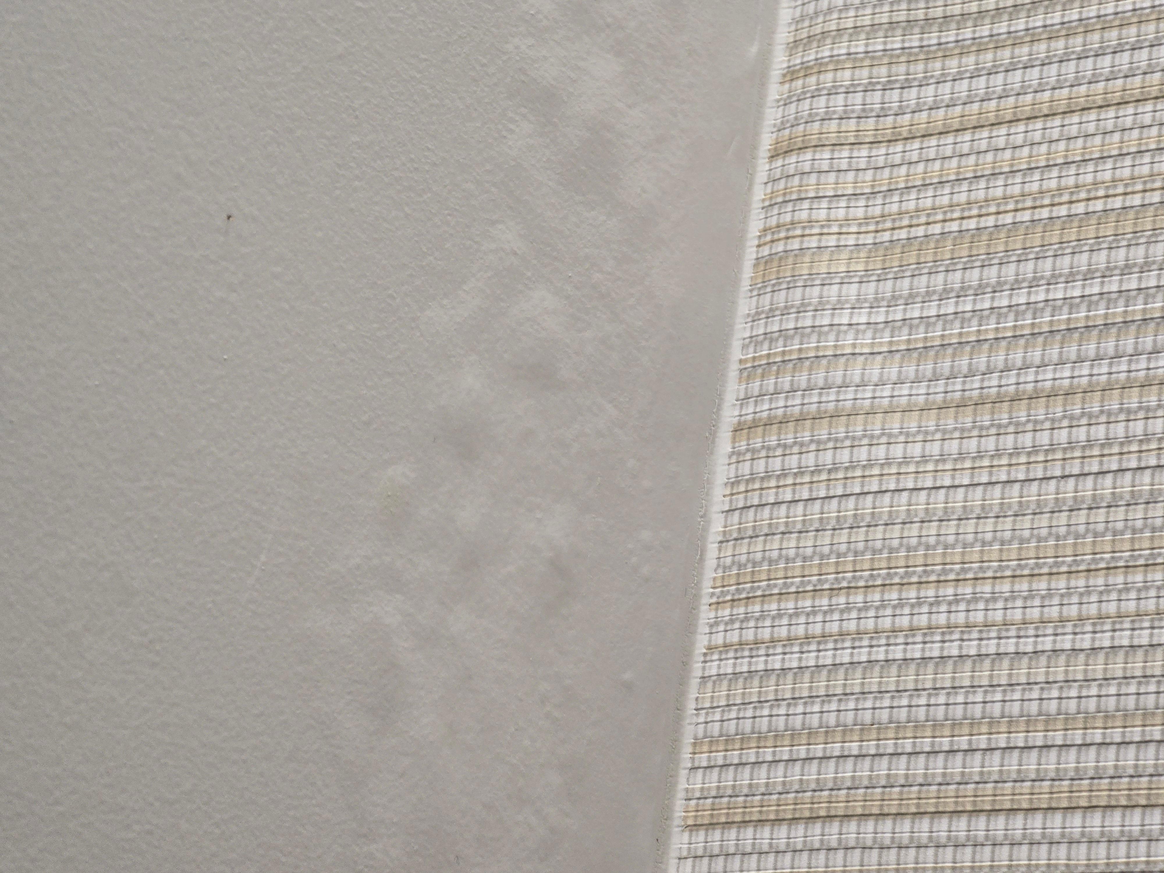 Bubbles in ceiling paint due to excessive moisture 