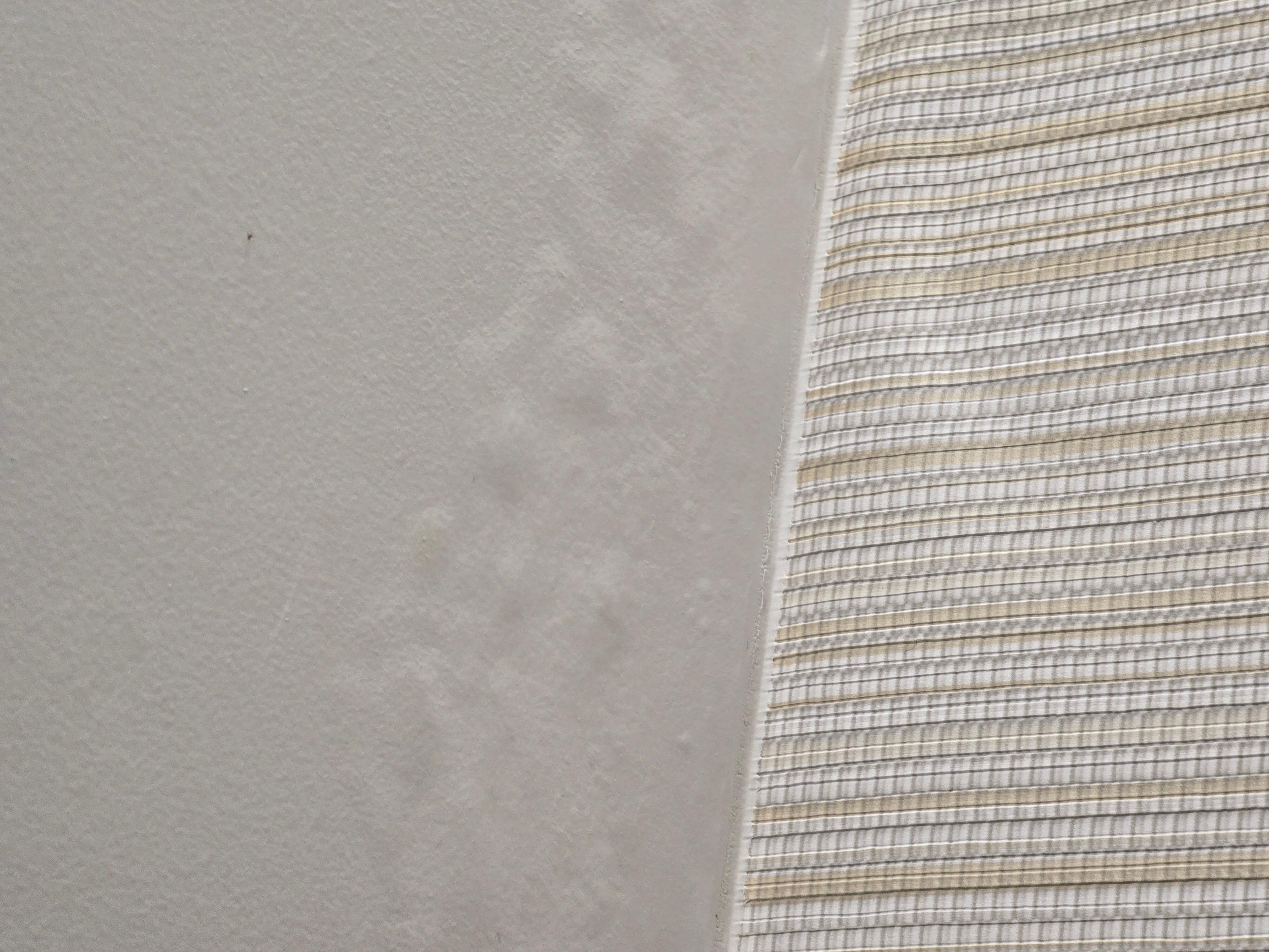Bubbles in ceiling paint due to excessive moisture 