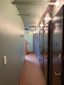 Private toilets + showers on women + floor