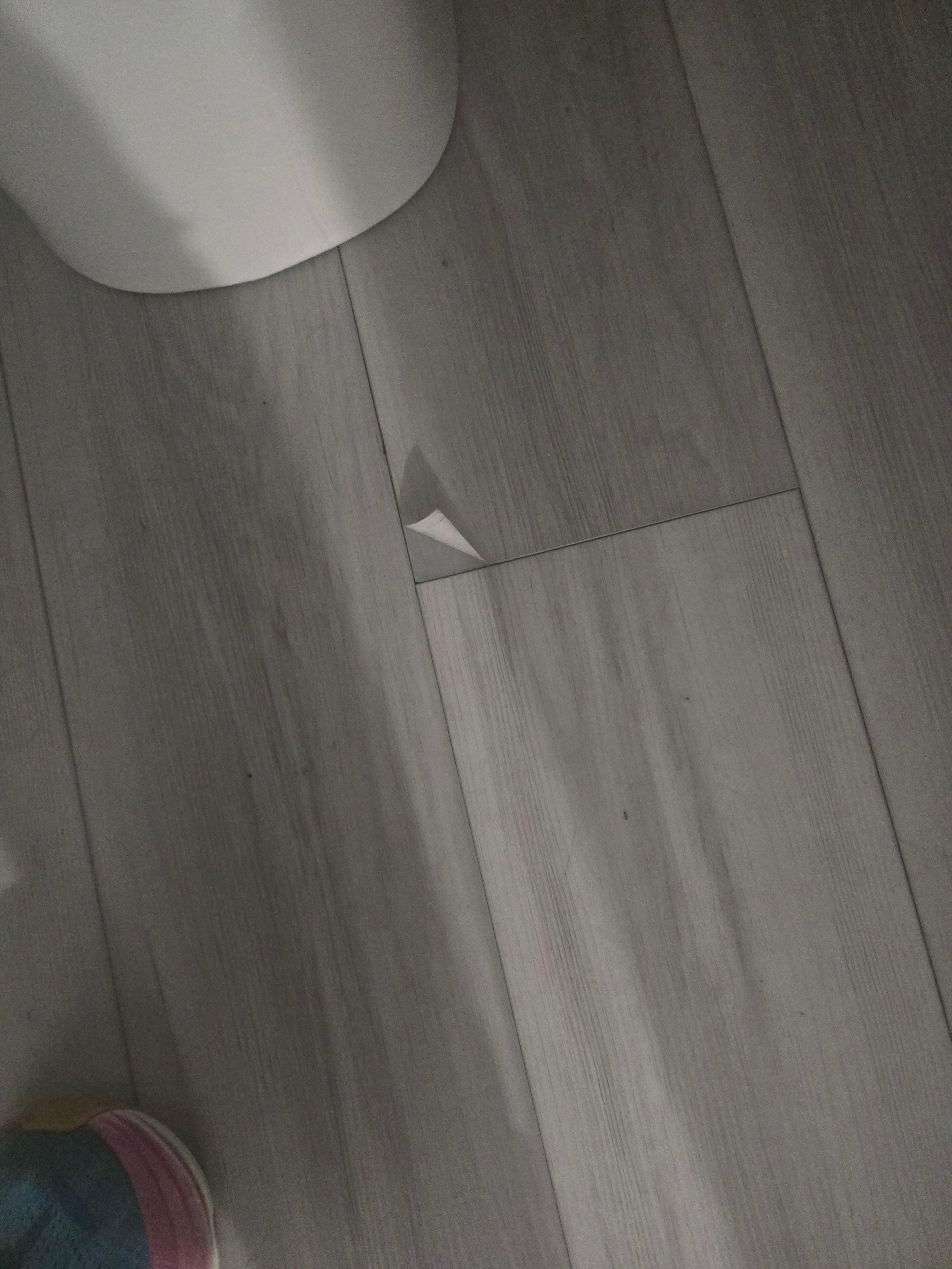 Peeling floor in master bath