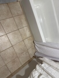 Water on the floor as well as along wall