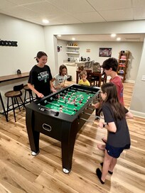 enjoying the foosball table
