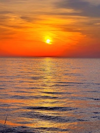 Stunning sunrise in front of cabin.