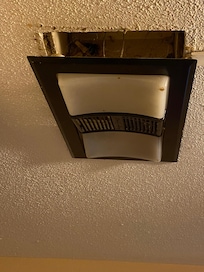 Bathroom vent/light hanging from ceiling. Light doesn't work.