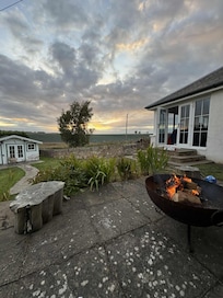 Enjoying the sun going down at the fire pit.