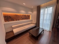 Office lounge that connects to master bedroom. Can be used to sleep on too.