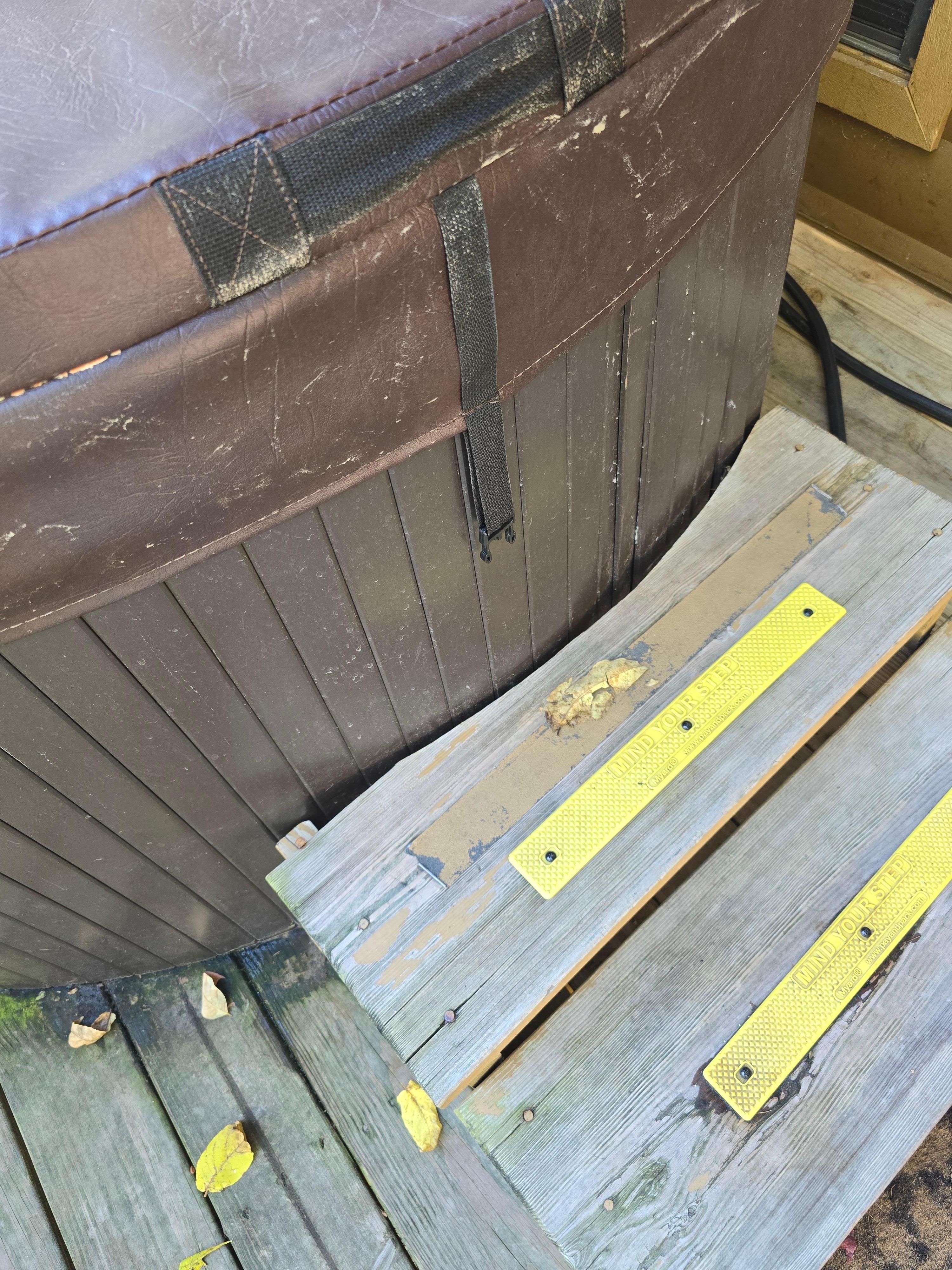 Nail head on back left corner was exposed and could cause a safety issue. 