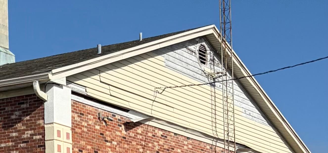 siding that is worn and falling off