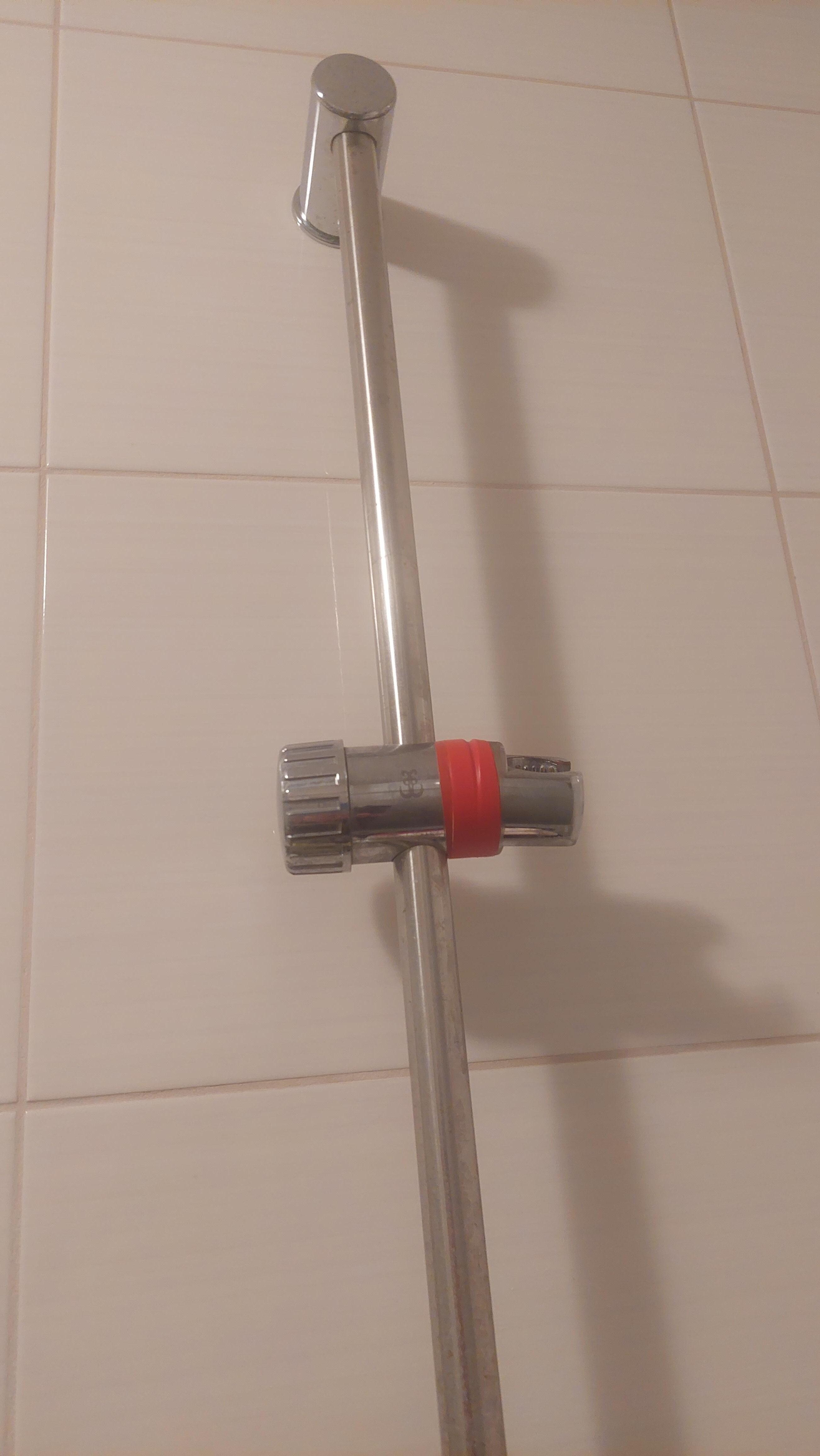 Broken shower head holder
