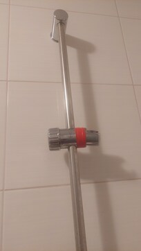 Broken shower head holder