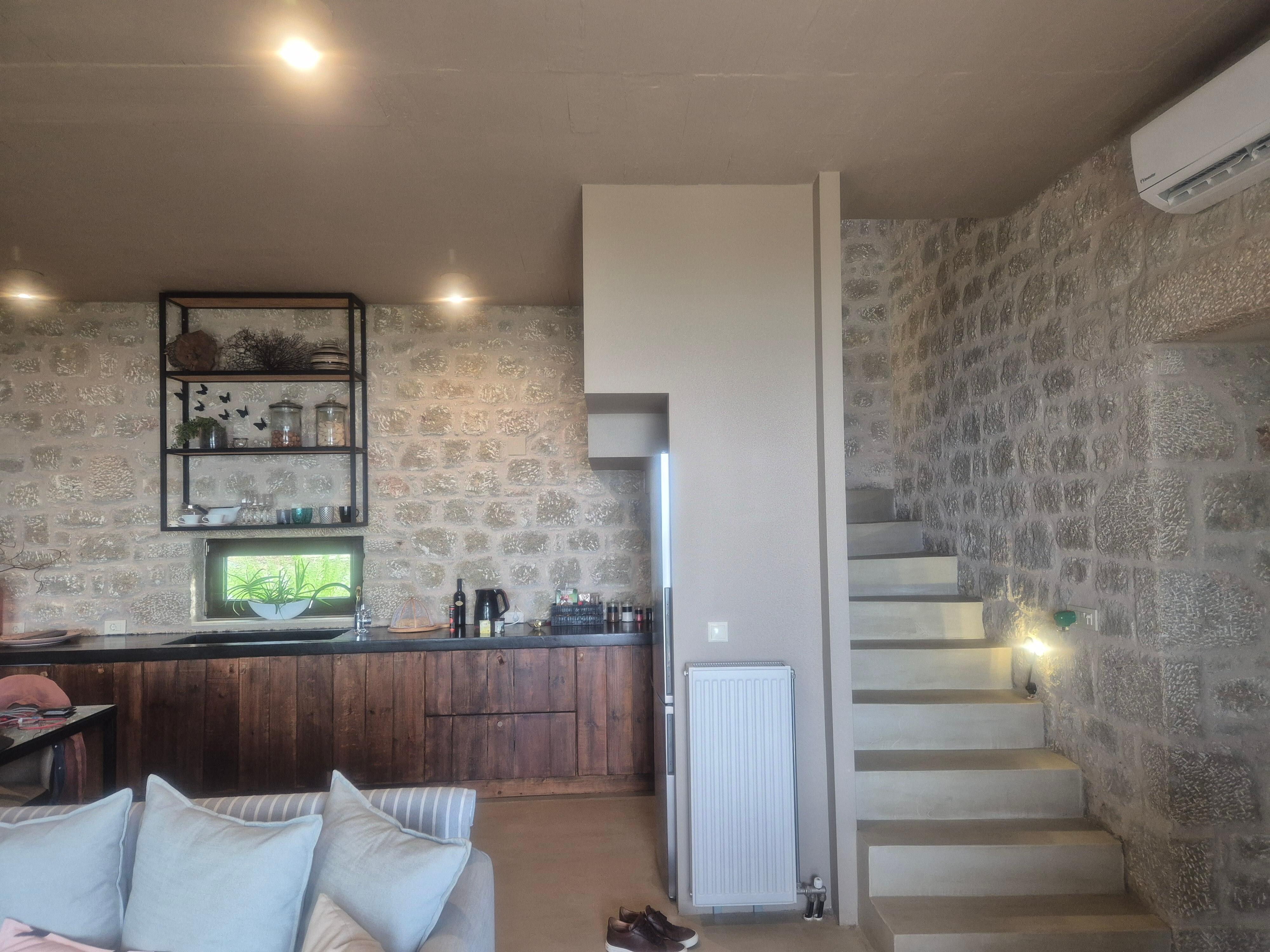 Lounge/kitchen, stairs to bedroom.