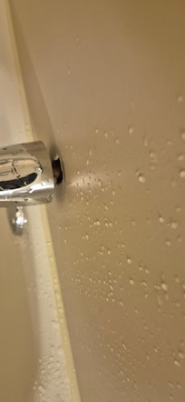 Bath spout coming out of the wall
