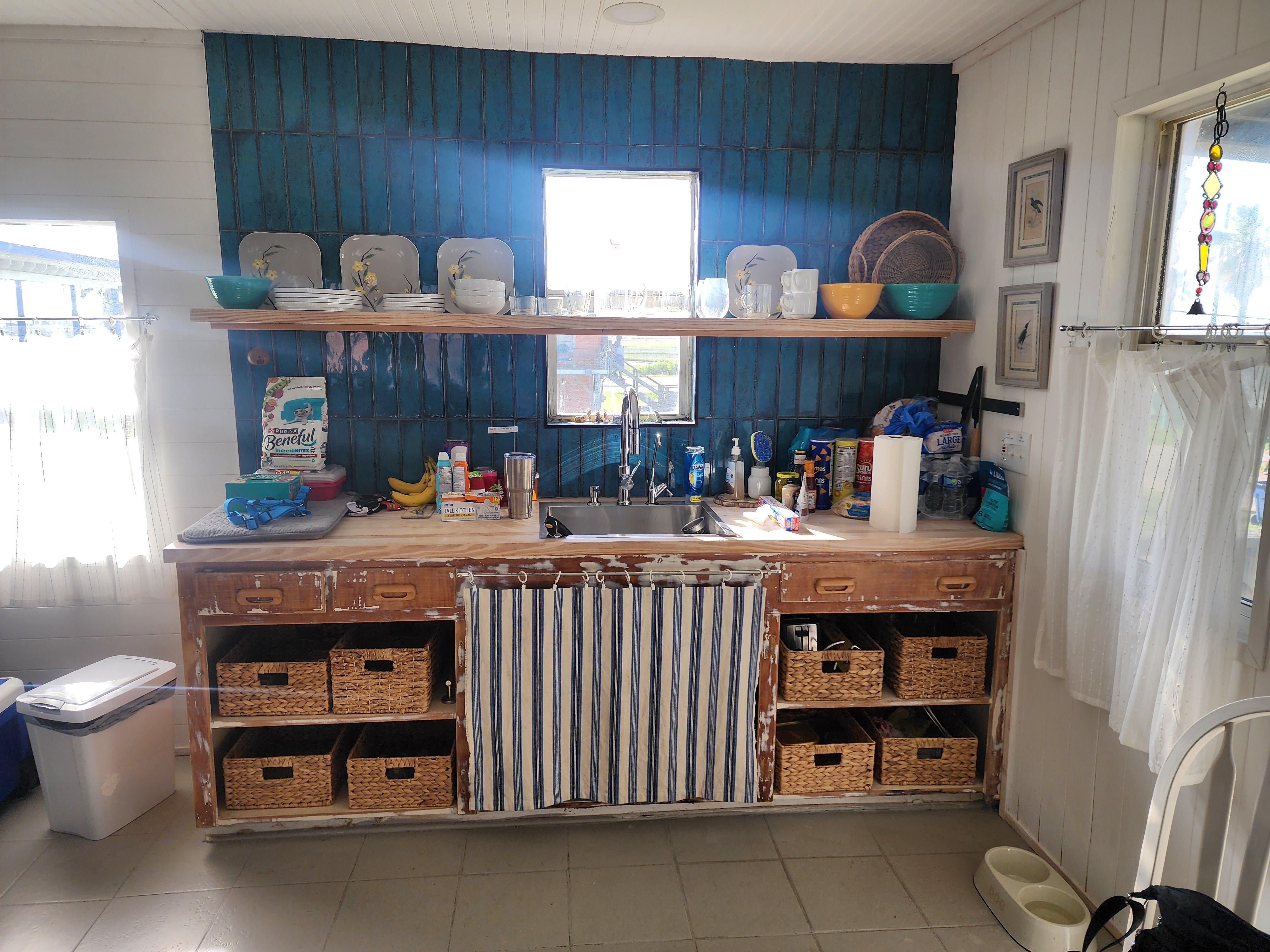 Cabinets are stocked with everything you need