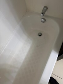 Bathtub water settles leaving rings of dirt