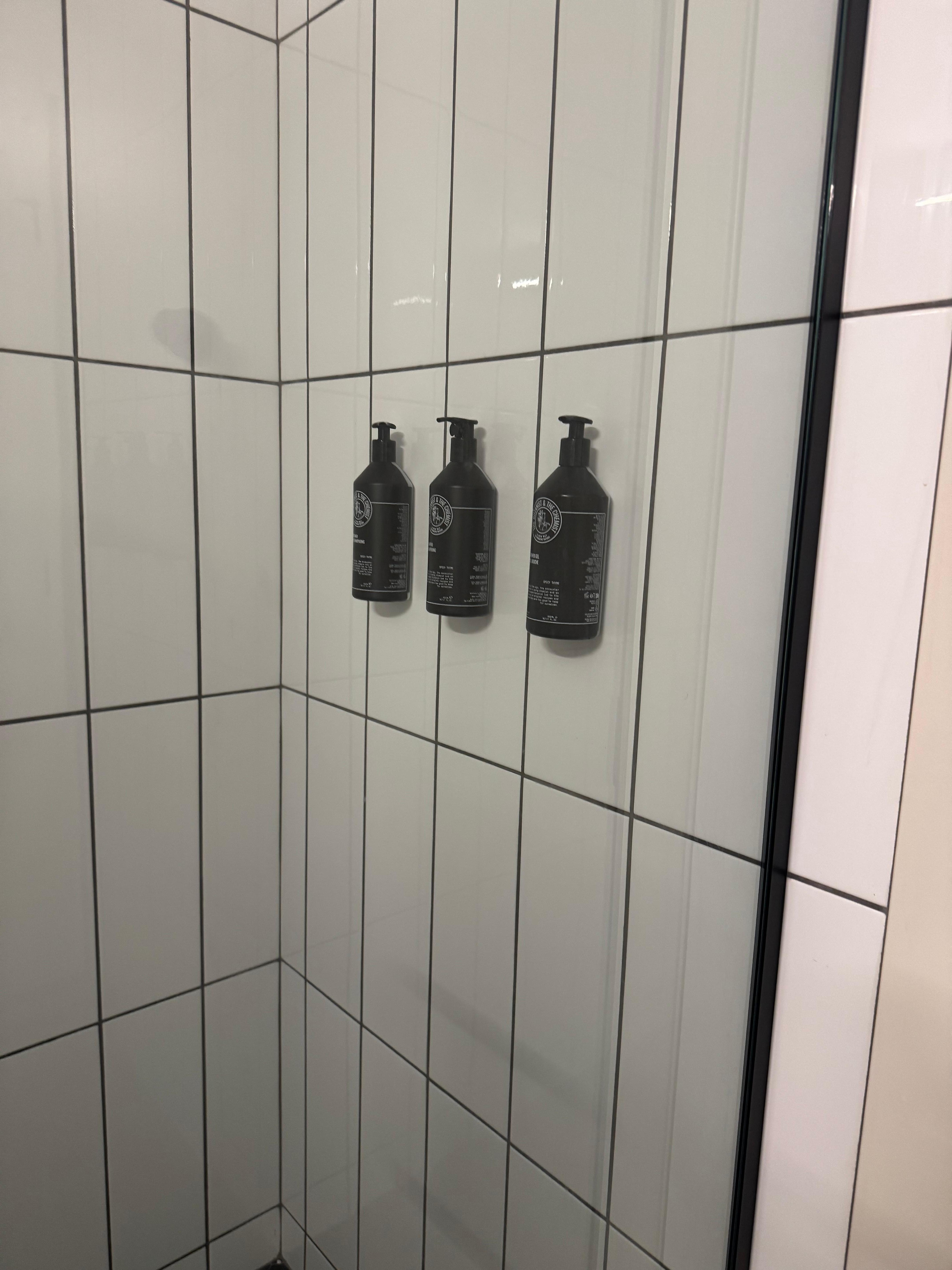 Cleanest shower ever! Even bottle “free float” hang on shower wall