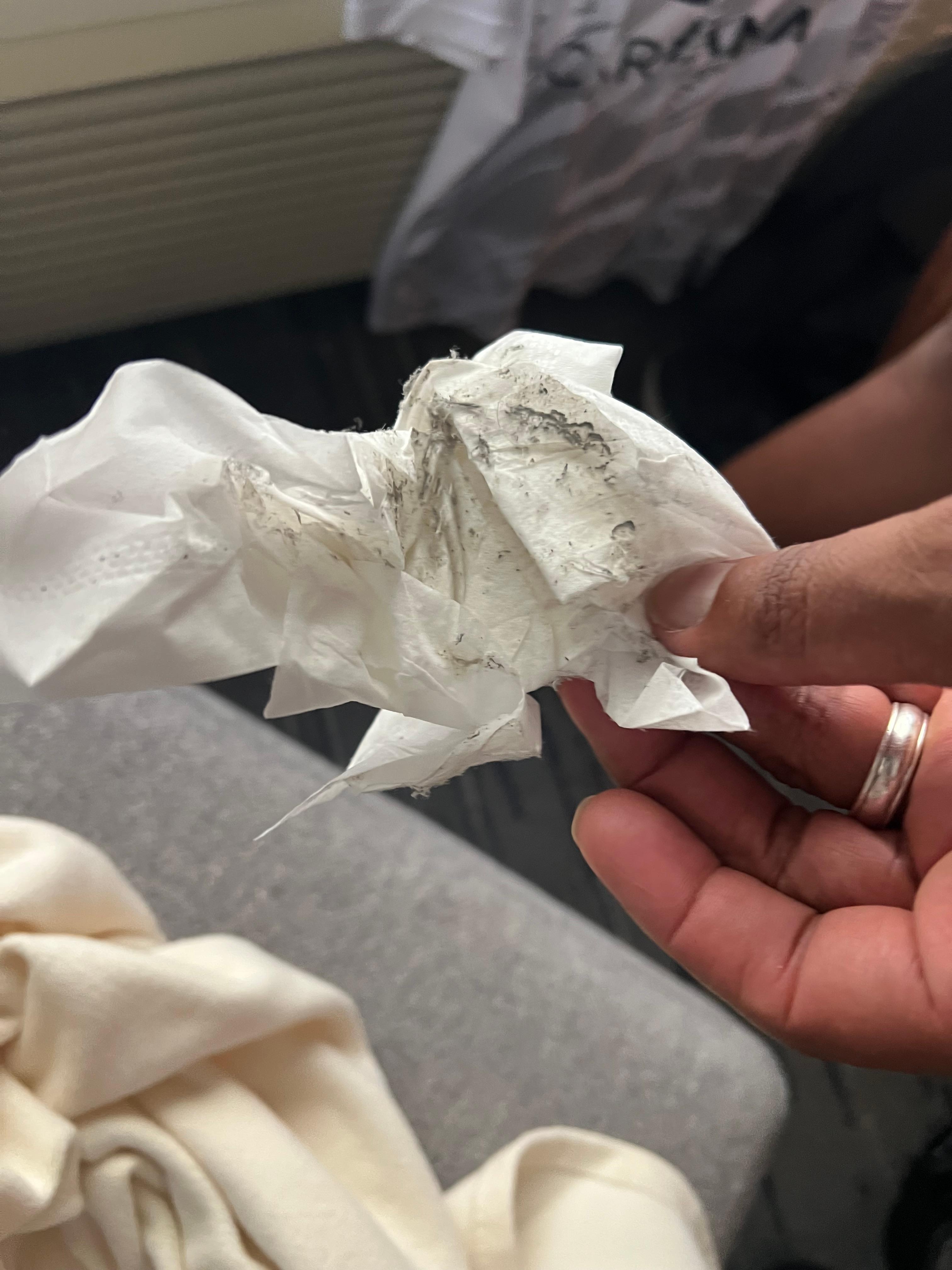 Dust we wiped off of counter and desktops in the room