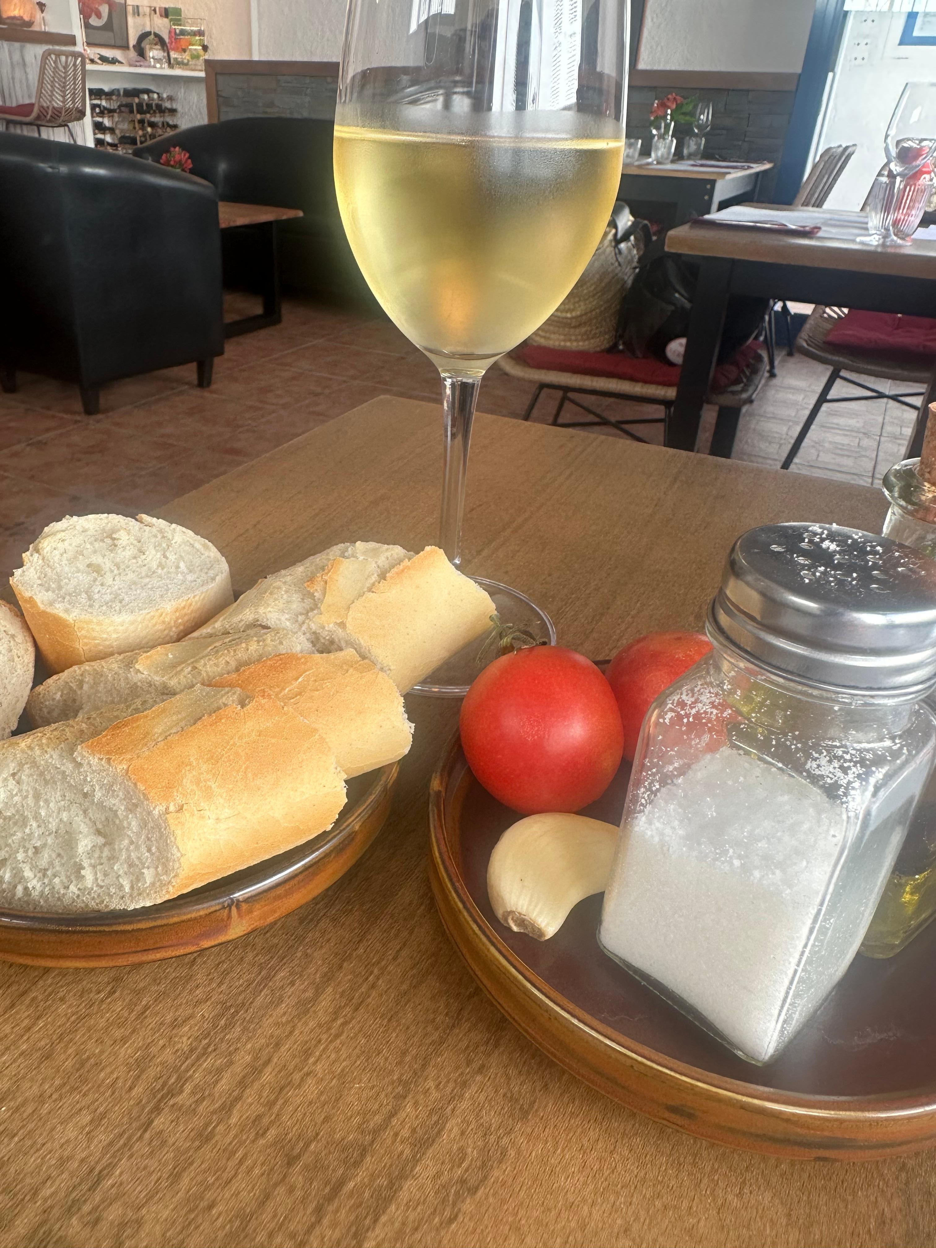 Rustic and traditional bread with local tomatoes, garlic and olive oil.