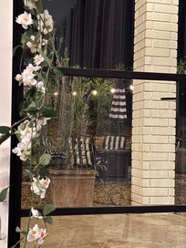 View looking out front door (our flower bday decoration)