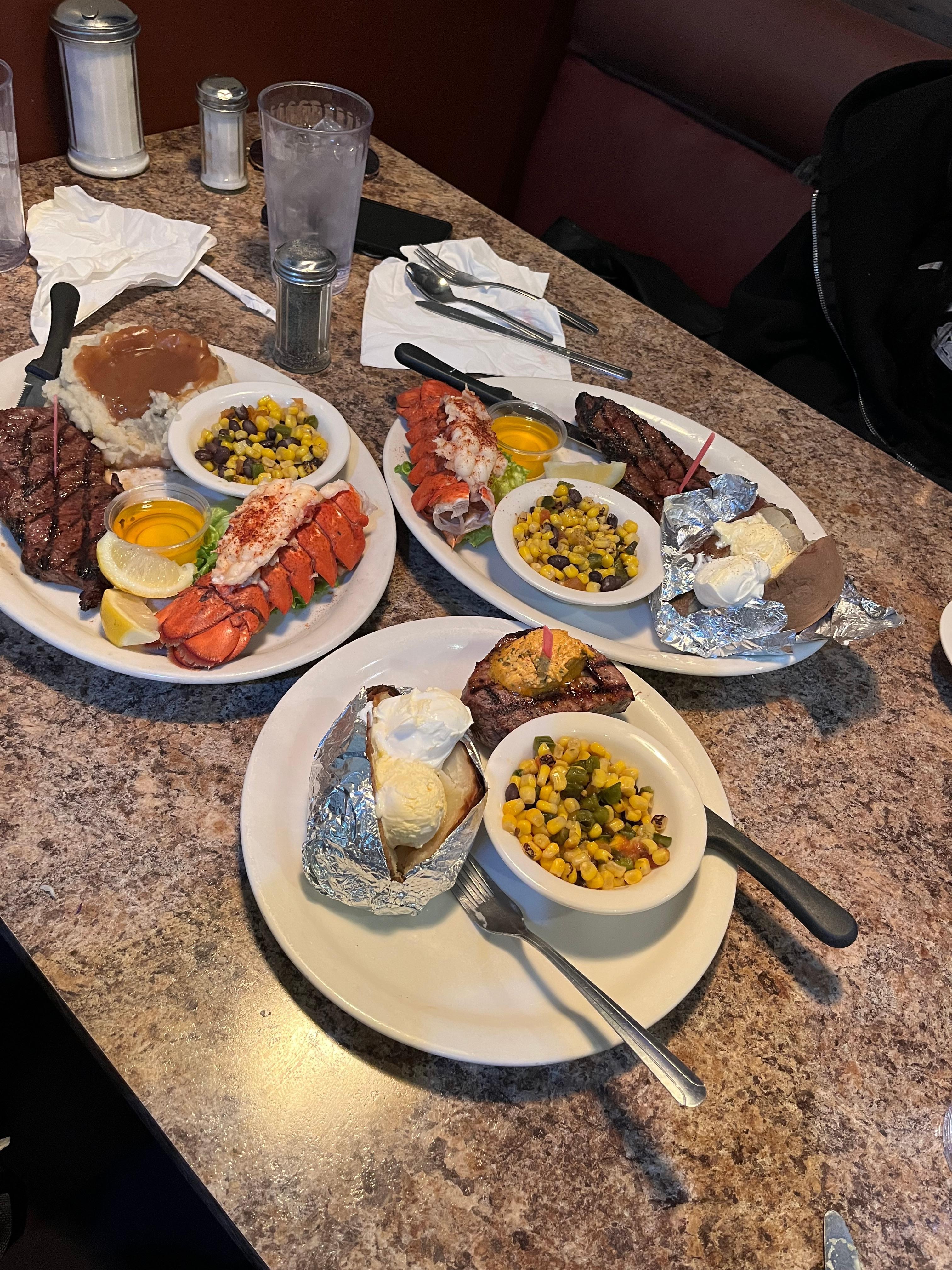 Special steak and lobster $21.99, steak and potato special $12.99.  Lots of locals!