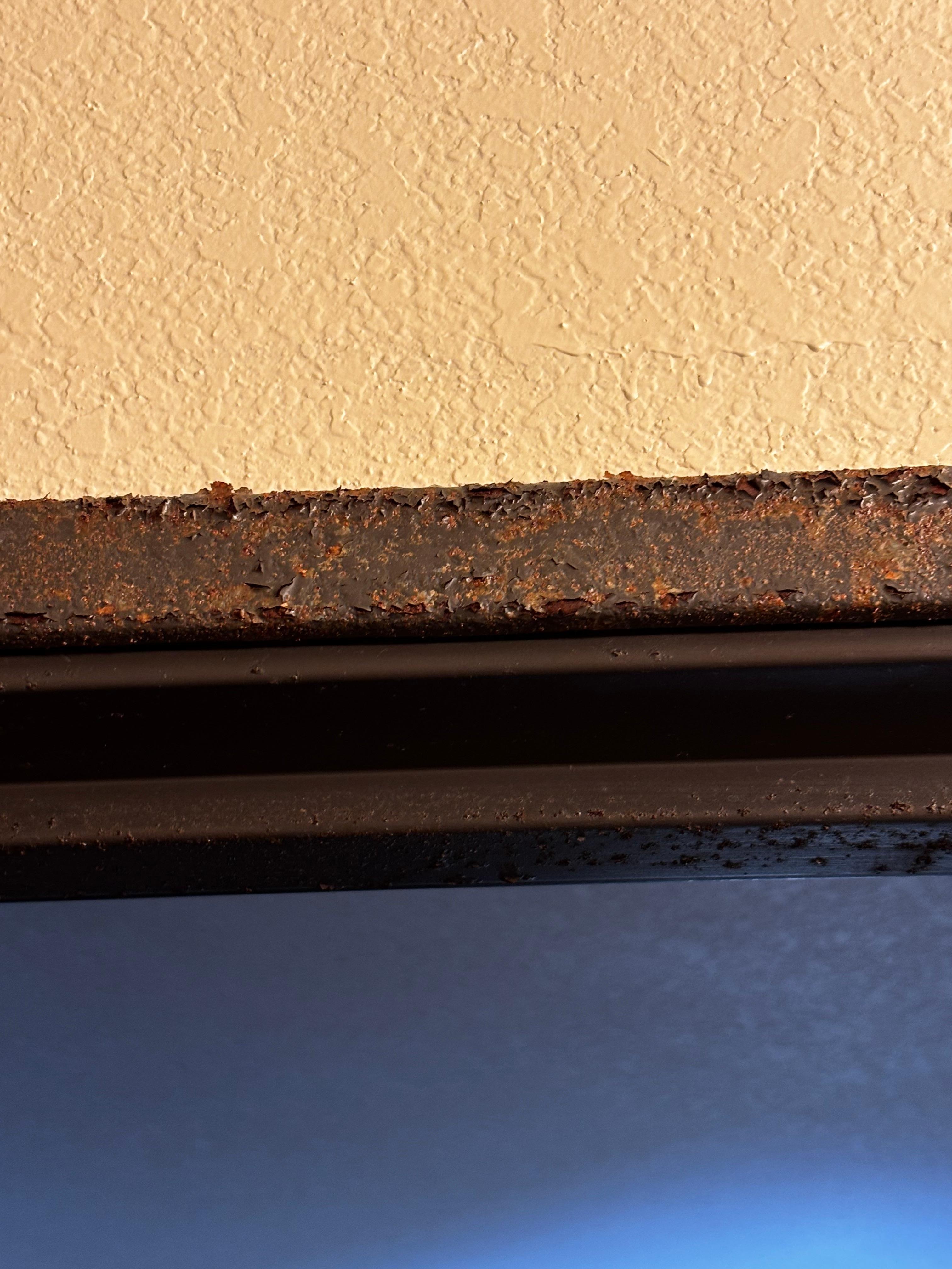 Close up of rust on bathroom door