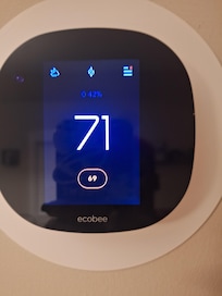 Thermostat showing temp in the unit.