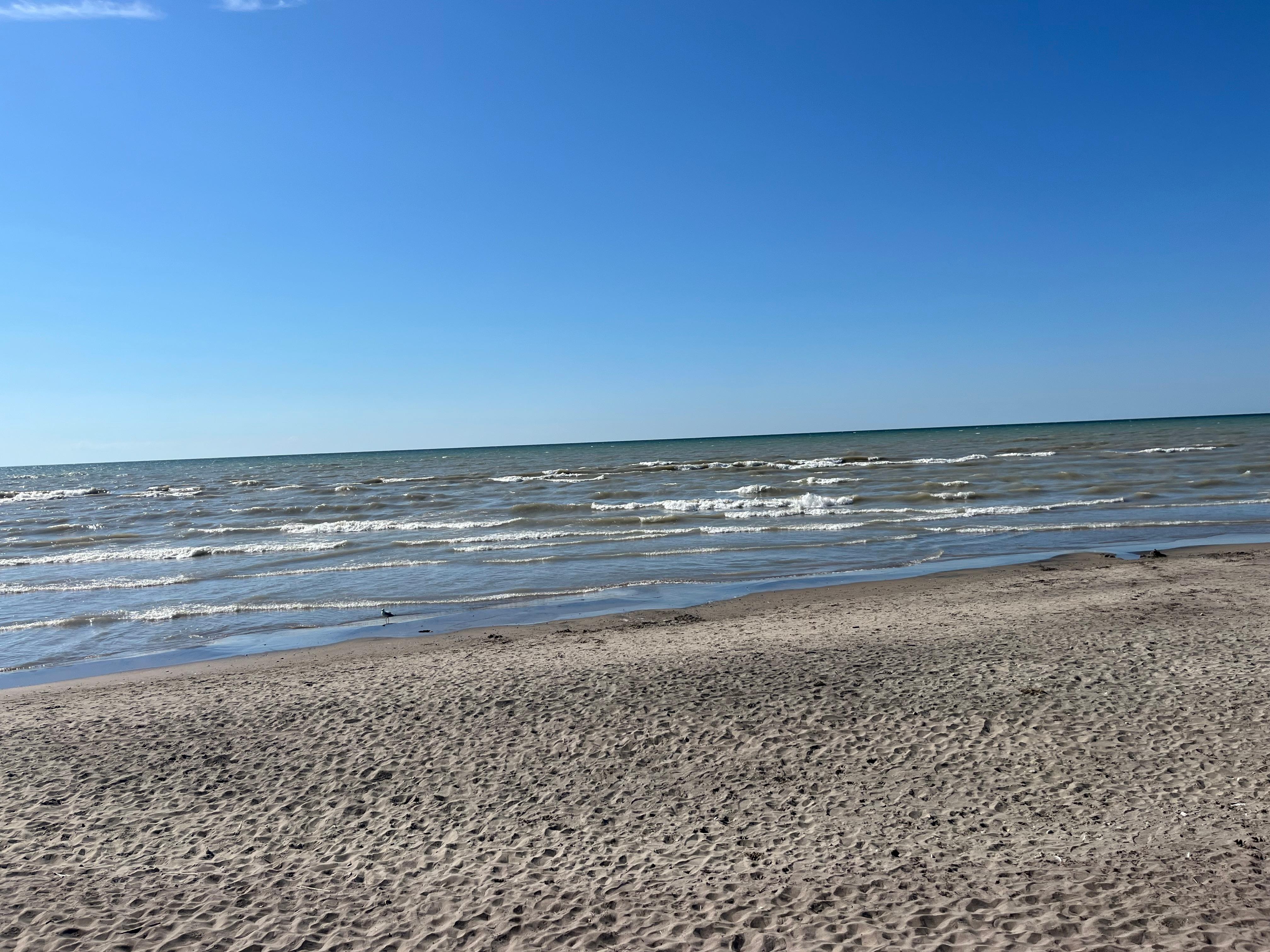 The view of the beach and lake