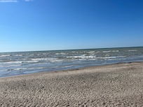 The view of the beach and lake