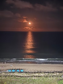 Orange moon from balcony