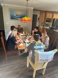 Enjoying our dinner kitchen right, family room left,