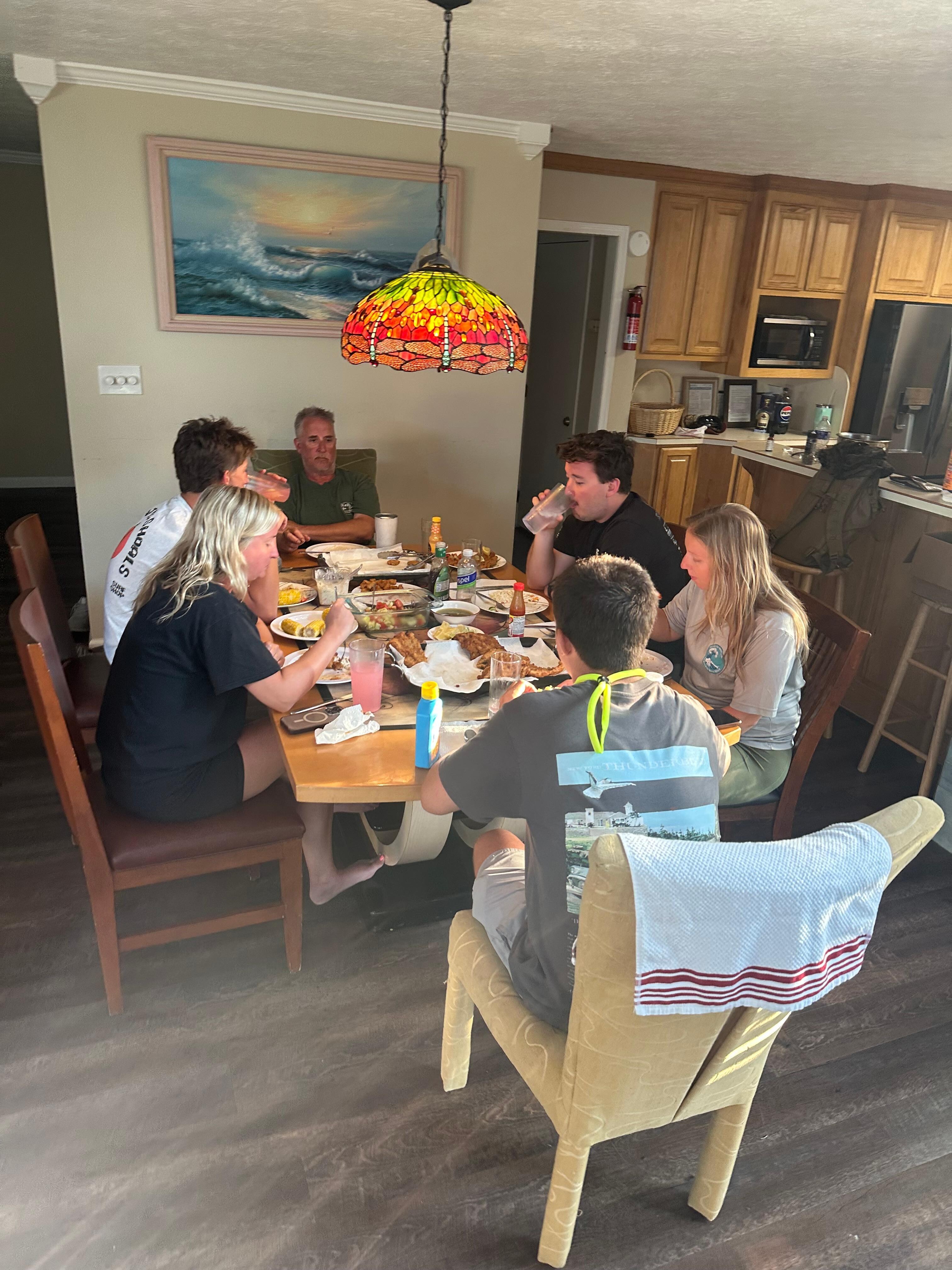 Enjoying our dinner kitchen right, family room left,