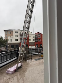 Unannounced Contractor gaining access to the deck and roof by using a ladder to access. Never went to the front door.