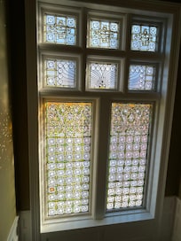 Windon on stairs to our room. Property is made up of four separate houses and the carriage house (arch photo)