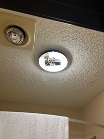 Light fixture in bathroom.