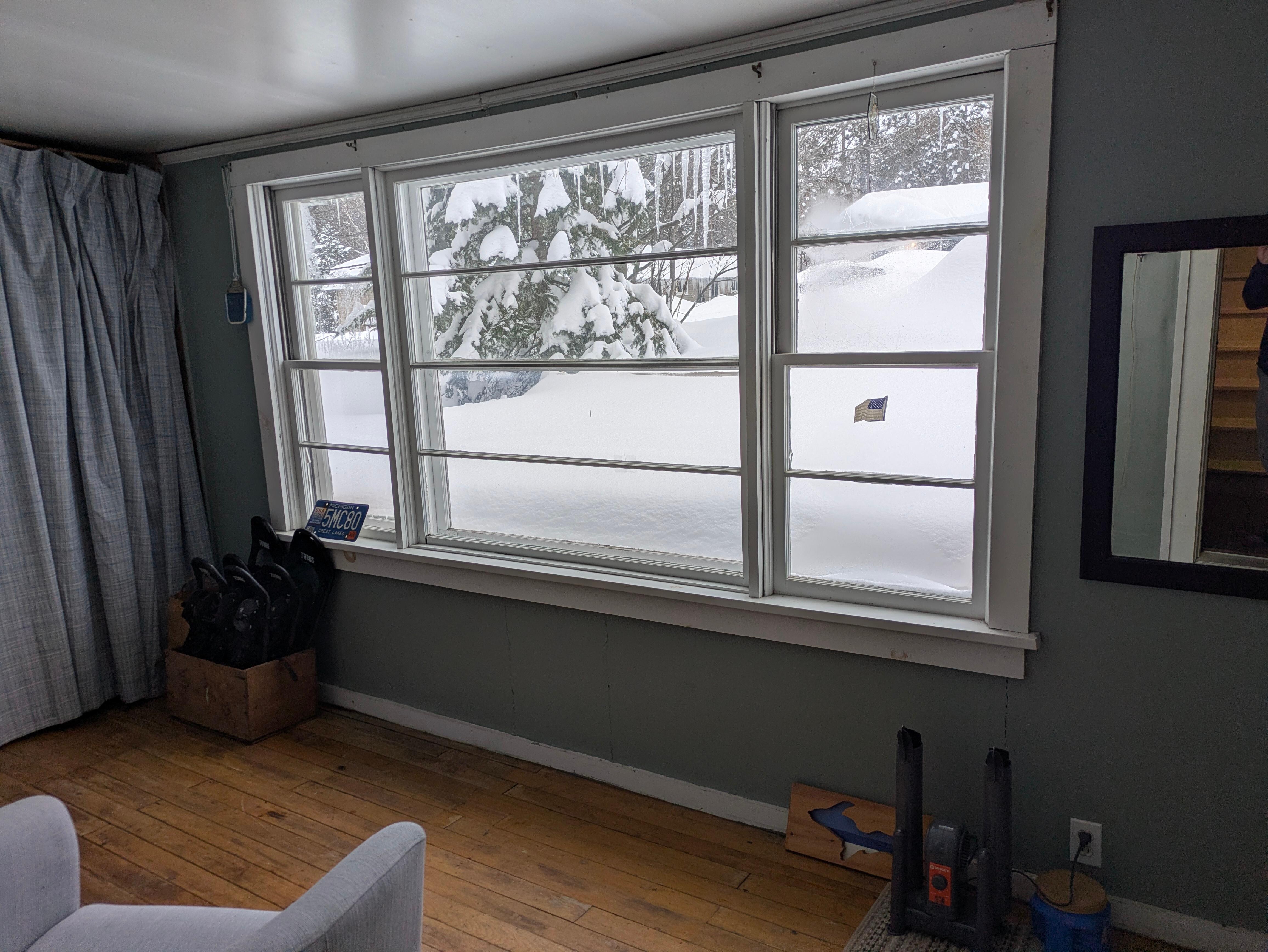 Snow porch. So much snow that it was hard to see the neighbors house across the street!