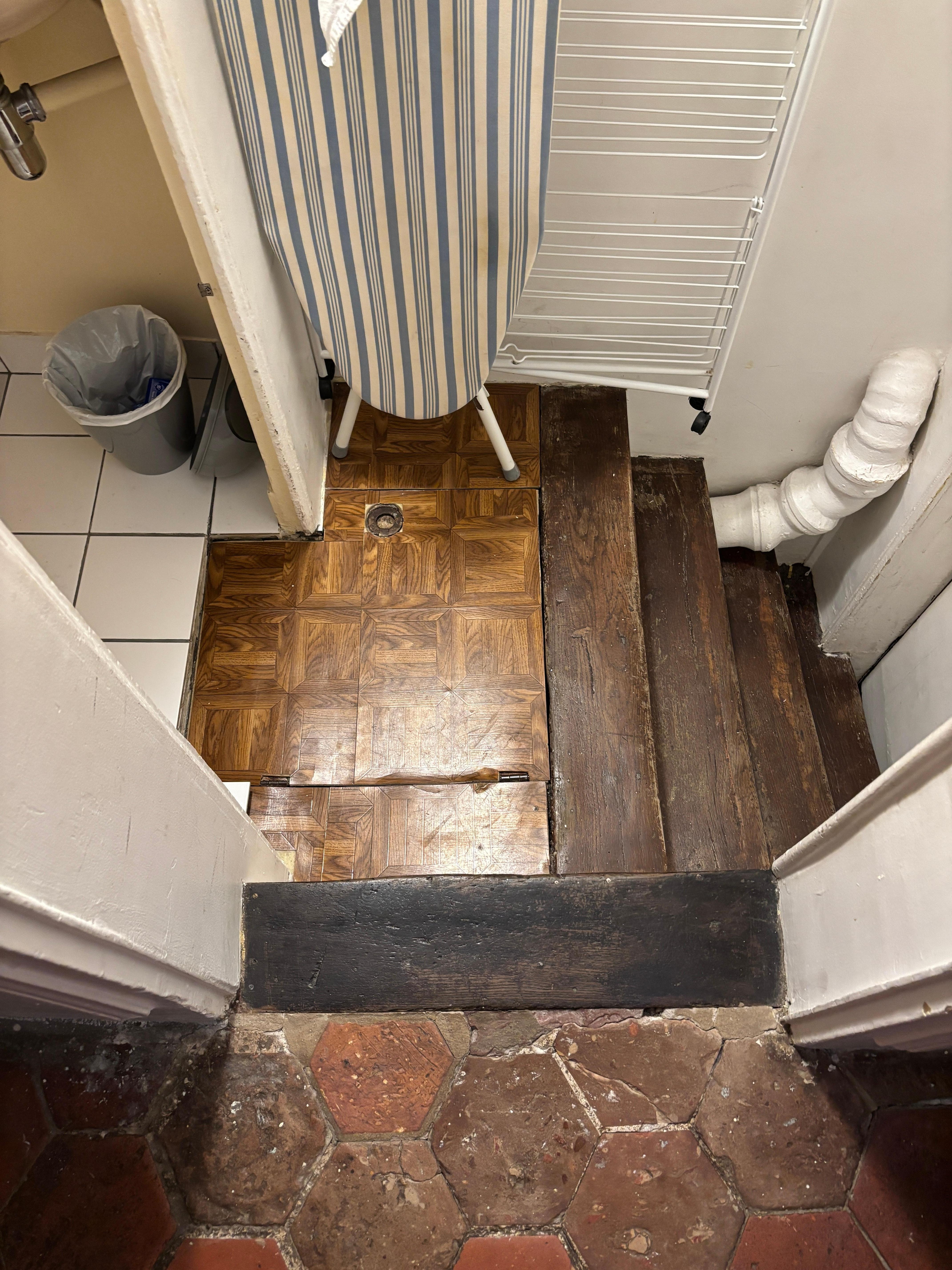 Uneven stairs to enter and exit studio