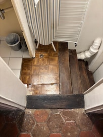 Uneven stairs to enter and exit studio