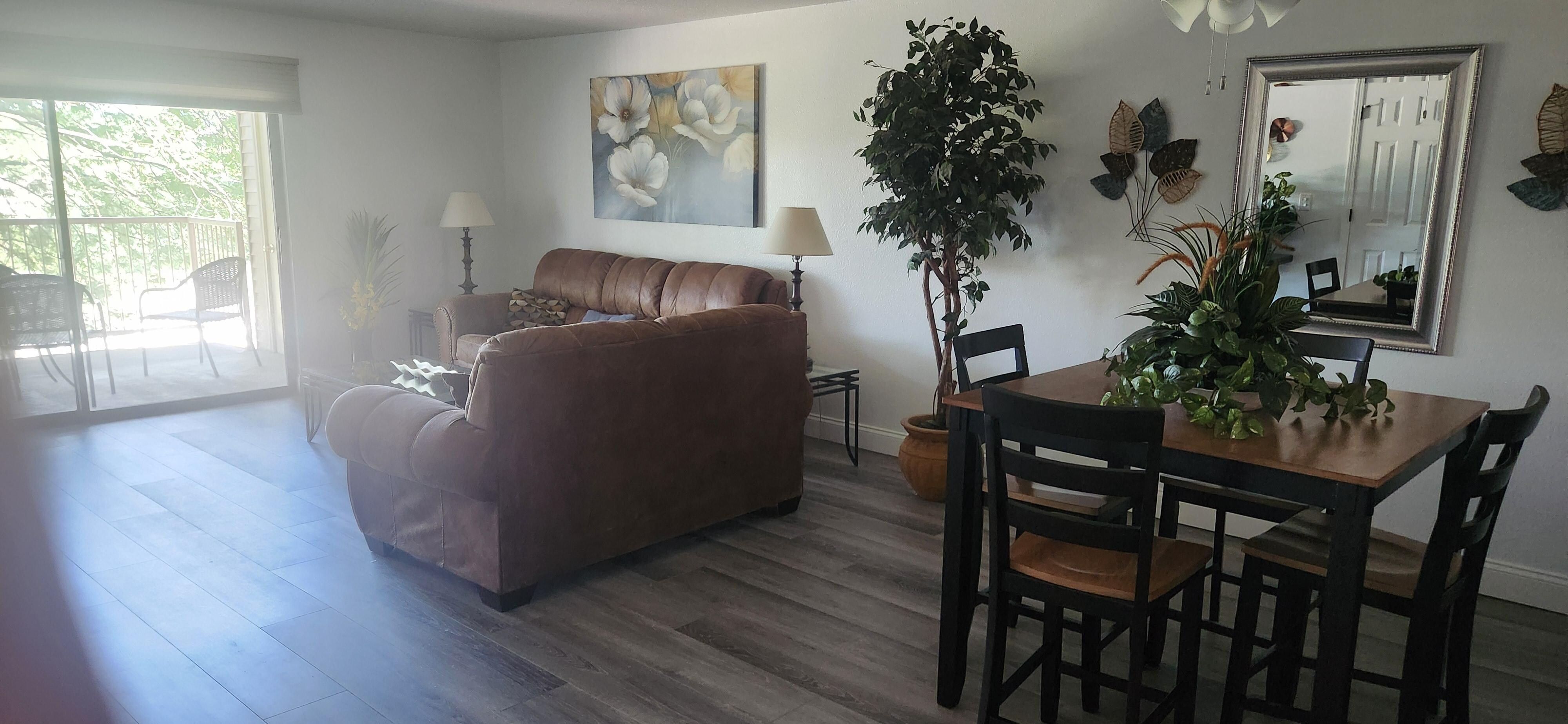 Living room area with a patio.