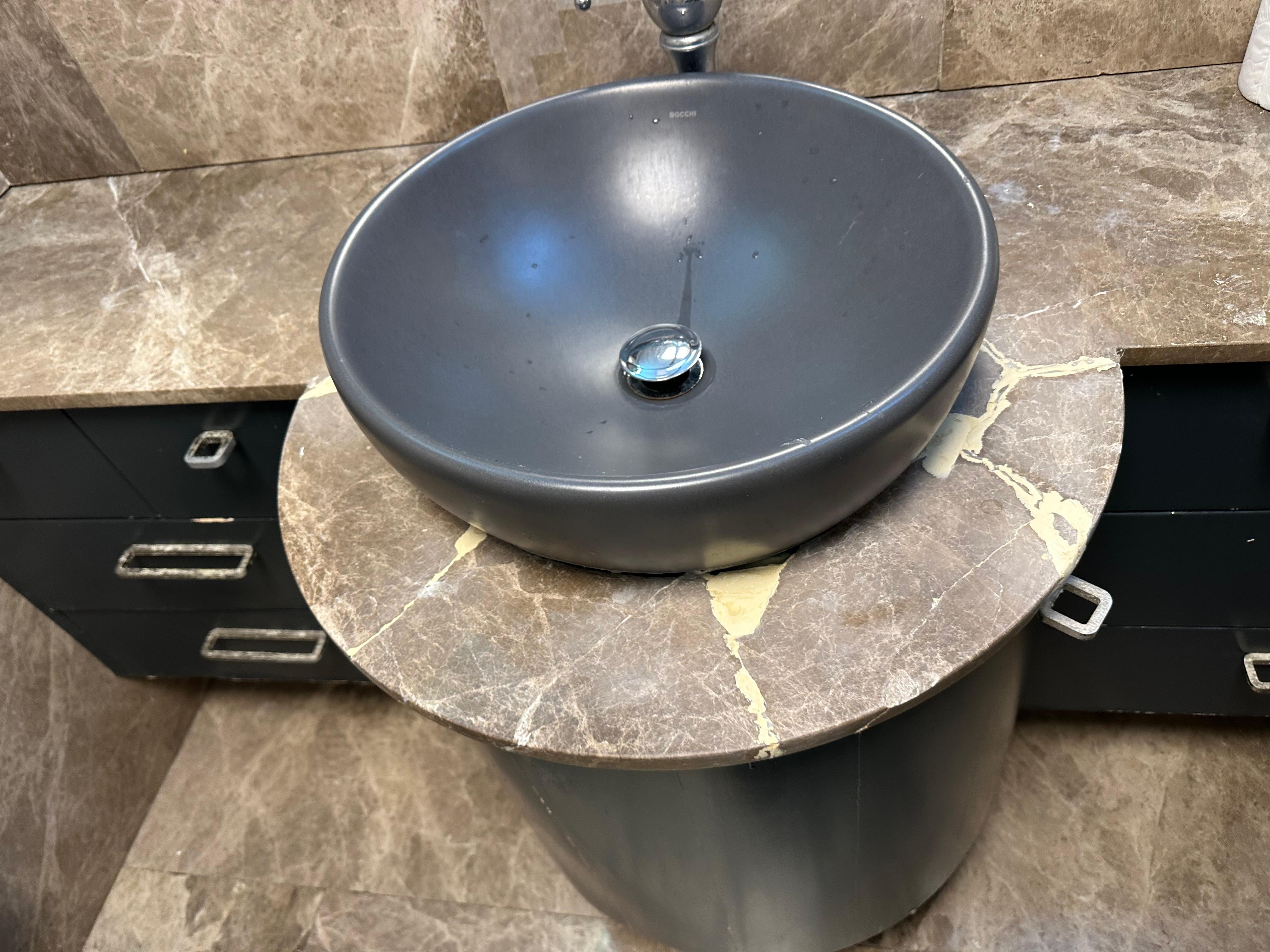 Broken bathroom sink/counter