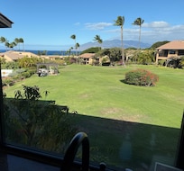 This is the view from the window at the kitchen sink. Although it really does not do the view justice, because the ocean is much closer than the picture makes it look.
